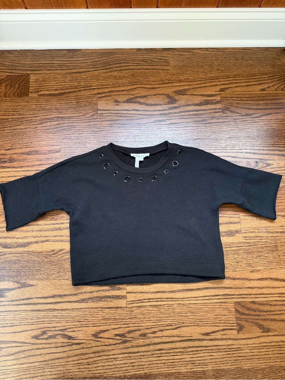 BCBGeneration Black Cropped Sweatshirt with Eyelet Neckline